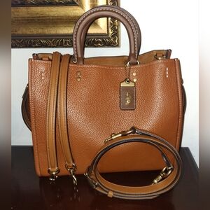 **SOLD**Coach Rogue